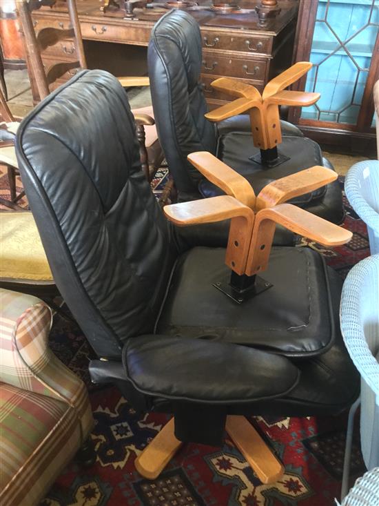 2 leather chairs and footstools
